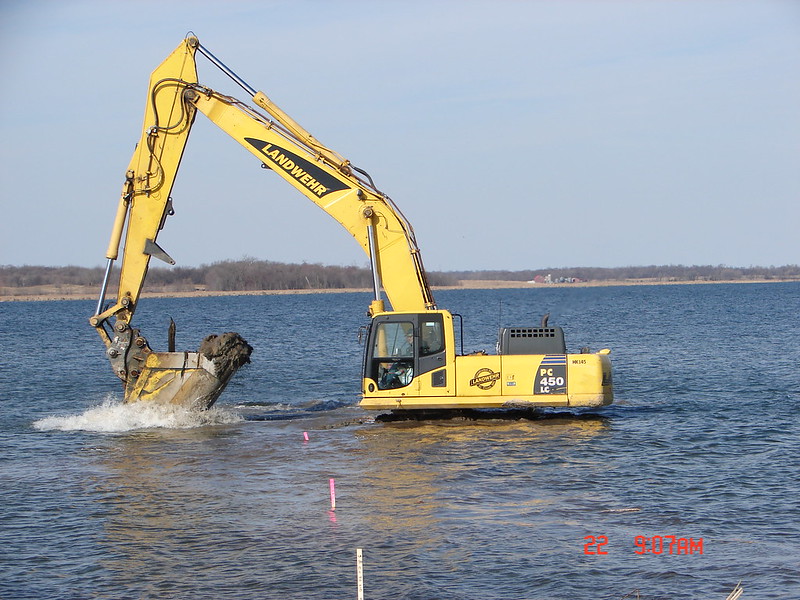 Excavator is used to restore habitat at Pelican Lake.