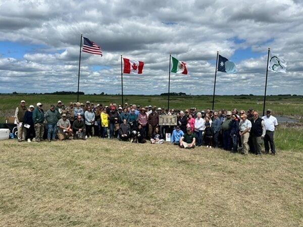 Attendees at the dedication of the Orange Waterfowl Production Area Enhancement in Douglas County, Minnesota.