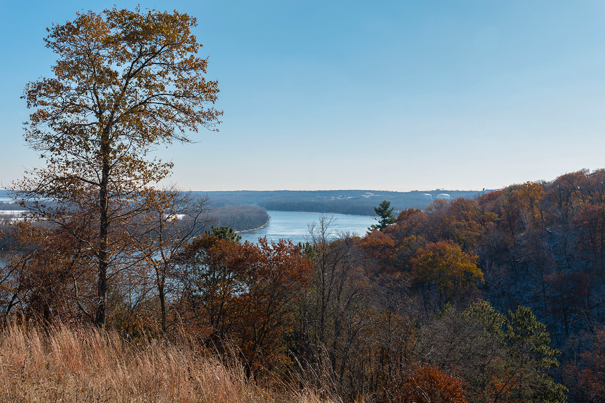 View of Pine Bend Bluffs Natural Area with view of river and hills.