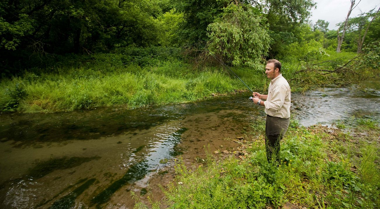 A fisherman on Vesta Creek within Choice WMA.