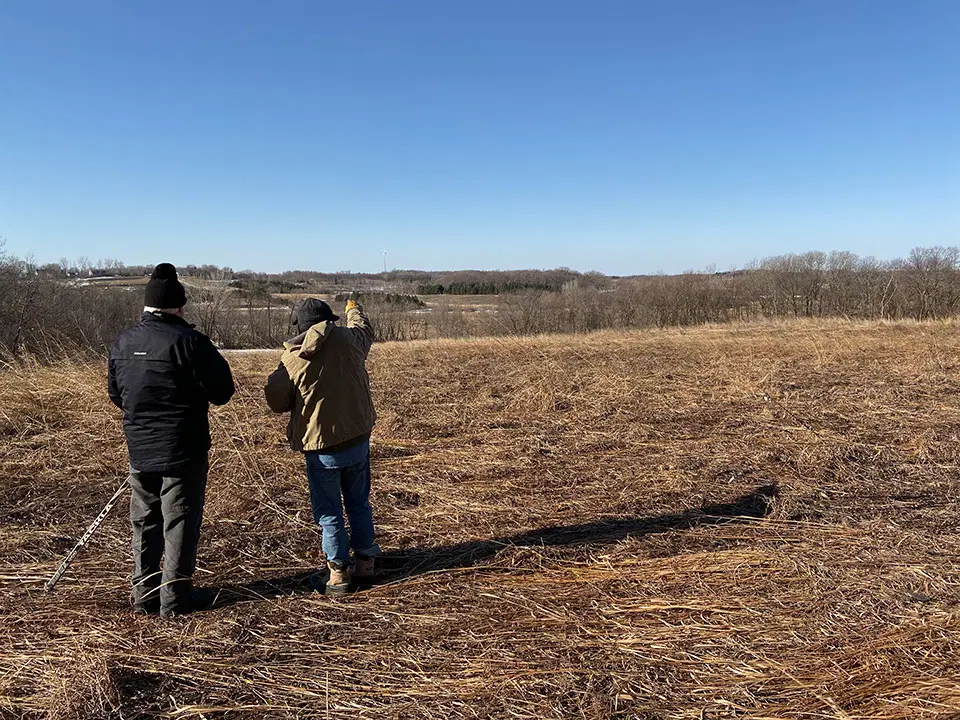 Visitors examine hillsides at Boyd Sartrell WMA.