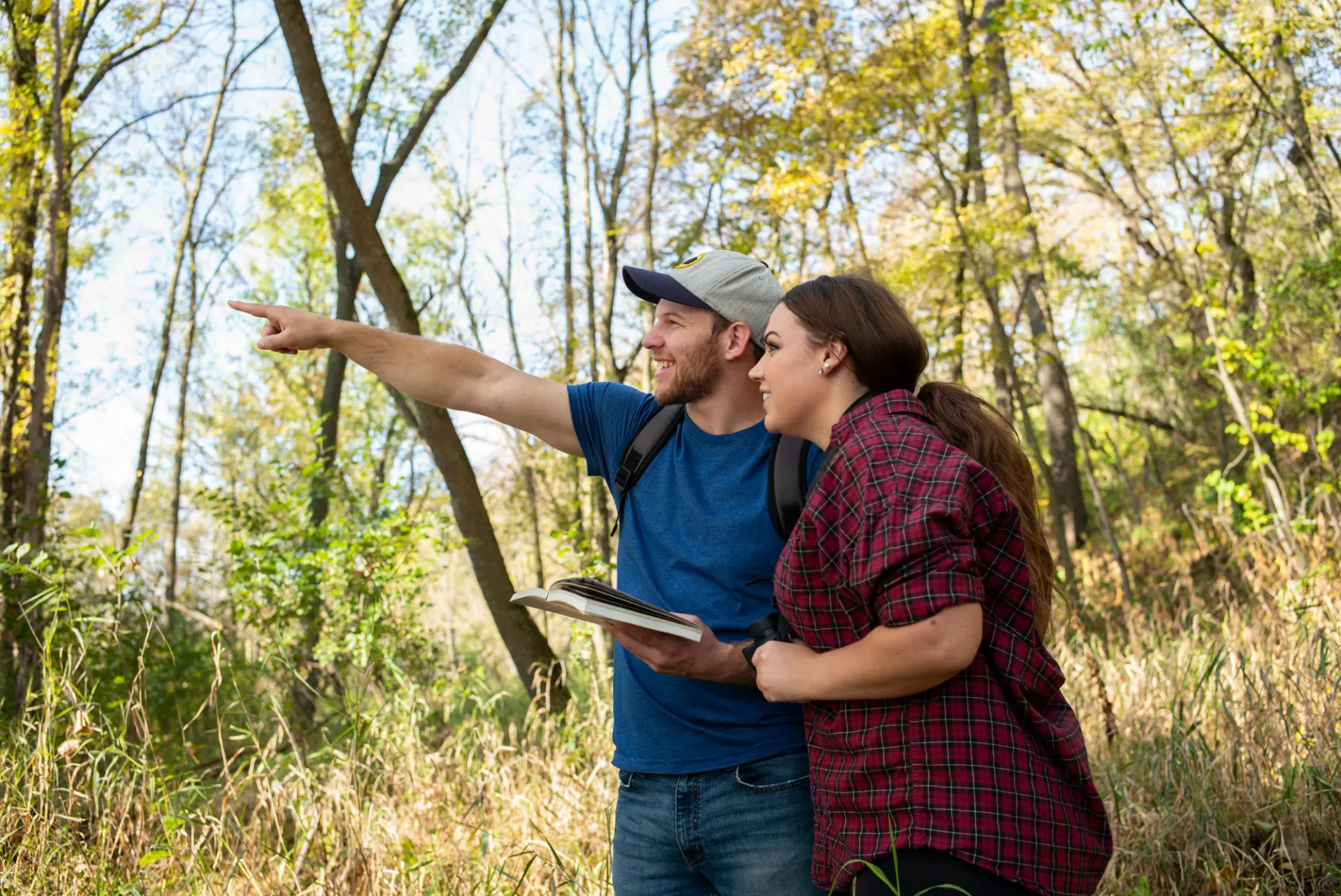 Visitors explore forest habitat at Richard J. Dorer Memorial Forest.