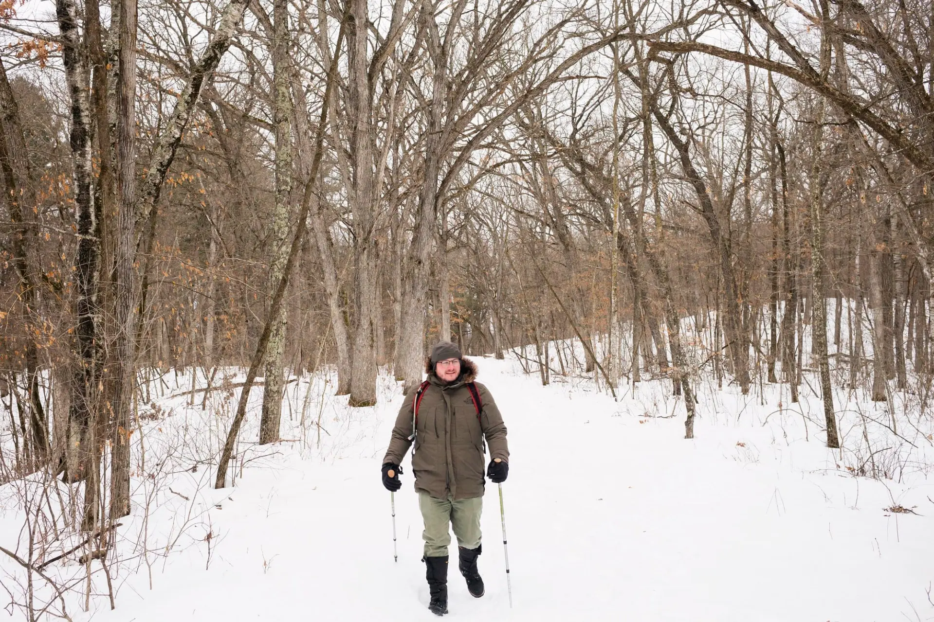 A visitor hikes during winter at Rock Marsh WMA.