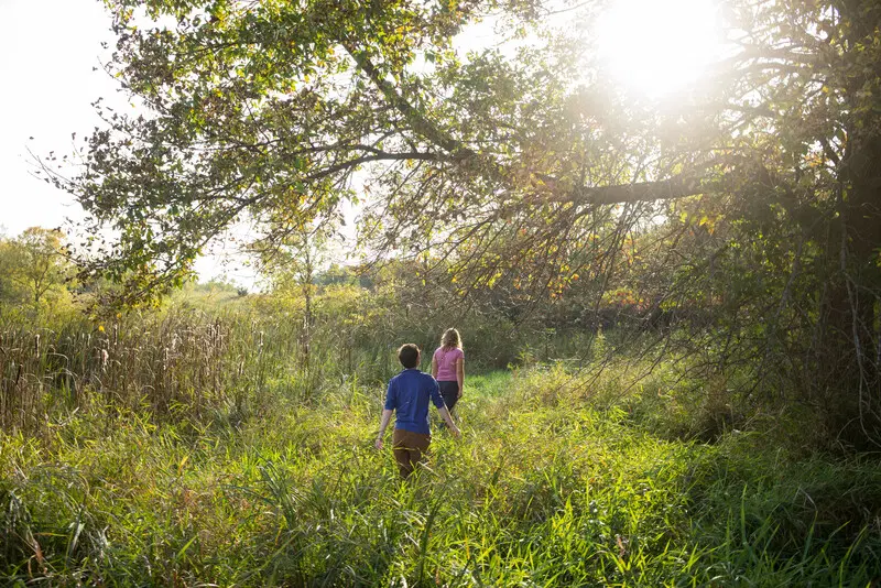 Visitors explore grasslands at Sakatah WMA.